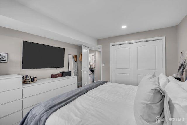 bedroom with a closet and recessed lighting