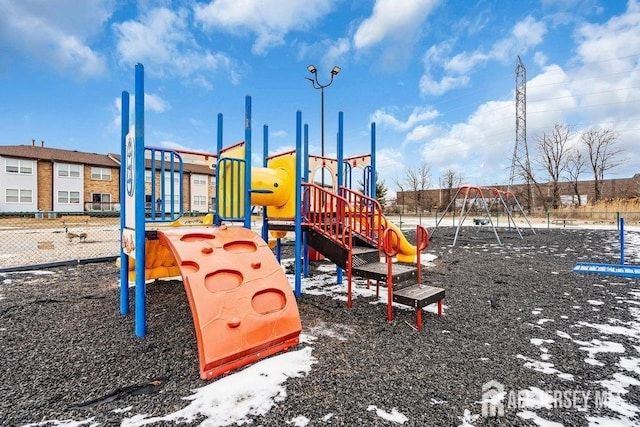 communal playground featuring fence