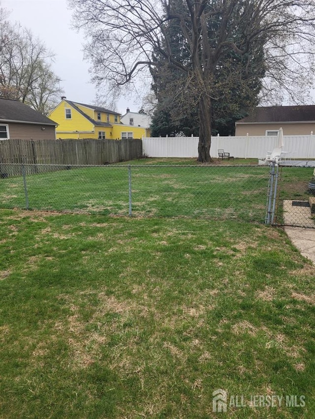view of yard featuring fence