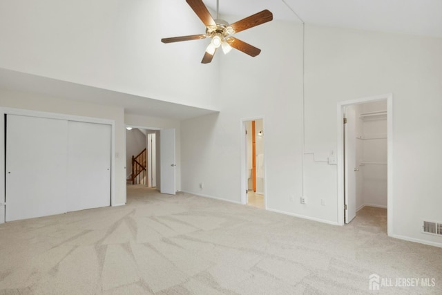 7 Tisbury Ct, Scotch Plains, NJ 07076 - unfurnished bedroom with high vaulted ceiling, carpet, a spacious closet, and a ceiling fan