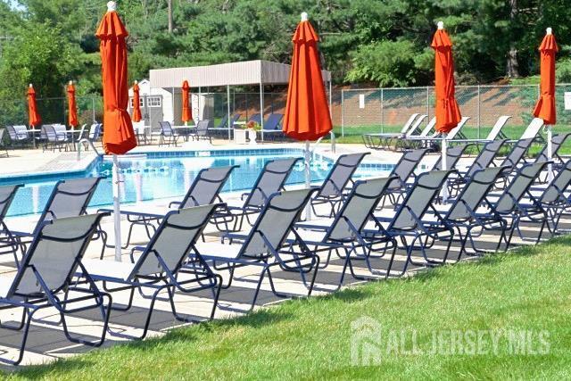 7 Tisbury Ct, Scotch Plains, NJ 07076 - community pool featuring a patio area