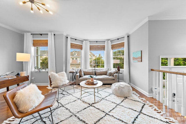 19 S Shore Dr, South Amboy, NJ 08879 - living room featuring wood finished floors, crown molding, baseboards, and a chandelier