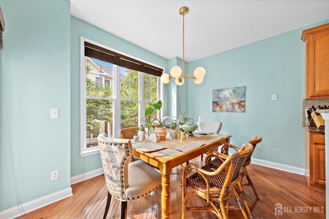 19 S Shore Dr, South Amboy, NJ 08879 - dining area featuring baseboards and light wood-style flooring