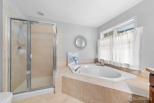 19 S Shore Dr, South Amboy, NJ 08879 - bathroom featuring a shower stall, a garden tub, tile patterned flooring, and toilet