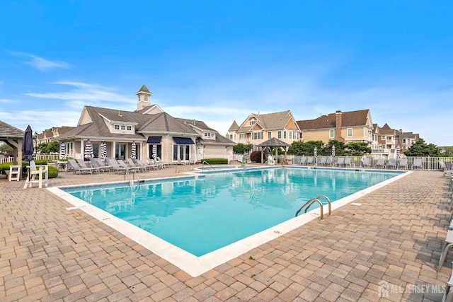 19 S Shore Dr, South Amboy, NJ 08879 - community pool featuring a patio area, a gazebo, and a residential view