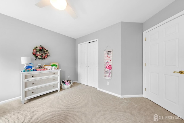 19 S Shore Dr, South Amboy, NJ 08879 - bedroom with carpet flooring, baseboards, a closet, and ceiling fan
