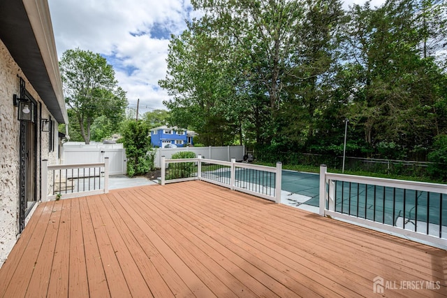 144 Elm St, Dover, NJ 07801 - deck featuring a fenced backyard and a patio area