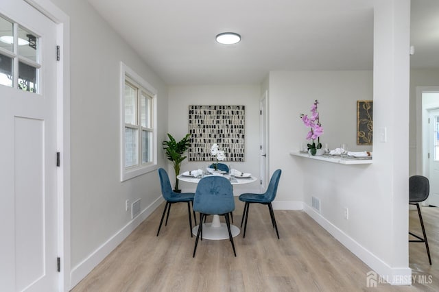 144 Elm St, Dover, NJ 07801 - dining area with wood finished floors