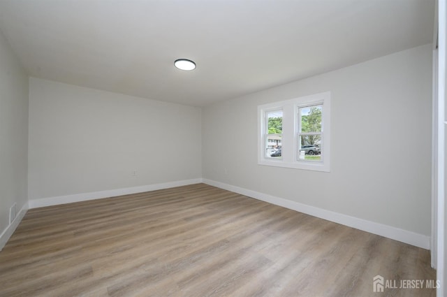 144 Elm St, Dover, NJ 07801 - unfurnished room featuring light wood-style flooring and baseboards