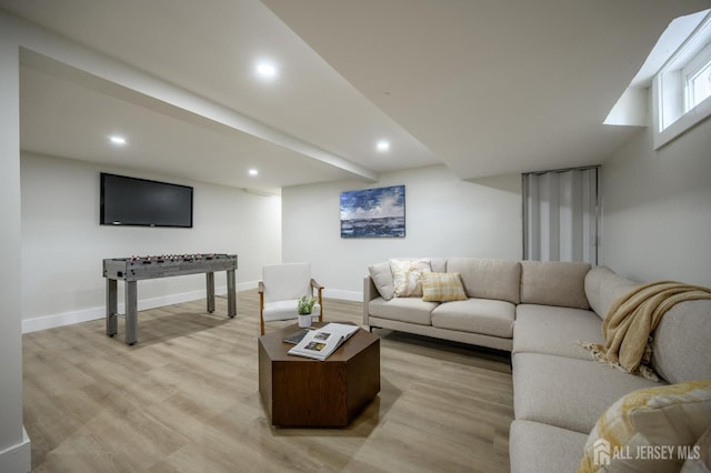 144 Elm St, Dover, NJ 07801 - living area with light wood-style flooring and recessed lighting