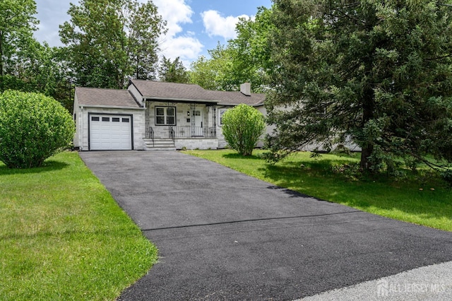 144 Elm St, Dover, NJ 07801 - view of front of house with a porch, an attached garage, a chimney, asphalt driveway, and stone siding