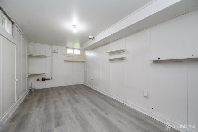 144 Elm St, Dover, NJ 07801 - basement with light wood-style flooring