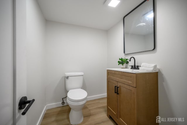 144 Elm St, Dover, NJ 07801 - bathroom featuring vanity and wood finished floors