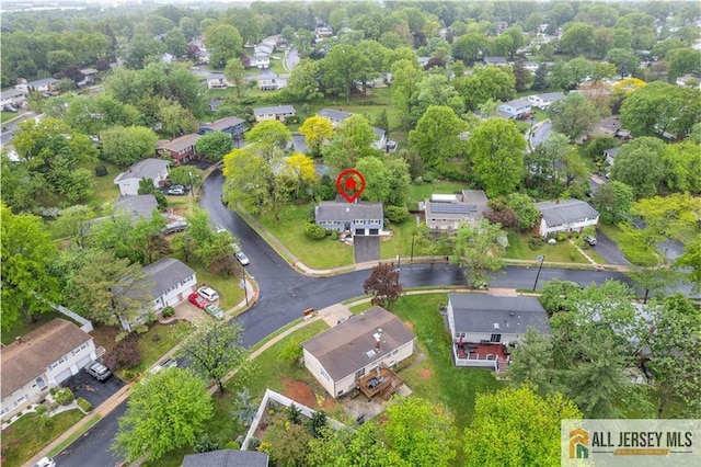 aerial overview of property's location featuring nearby suburban area