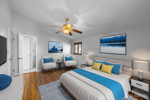 bedroom featuring ceiling fan, baseboards, vaulted ceiling, and dark wood-style flooring