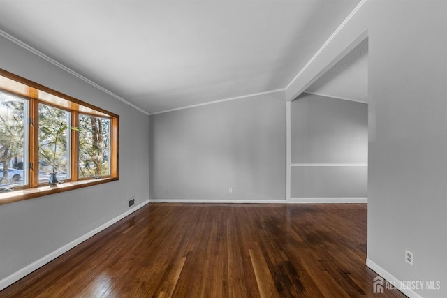 unfurnished room with baseboards, dark wood-style flooring, and ornamental molding