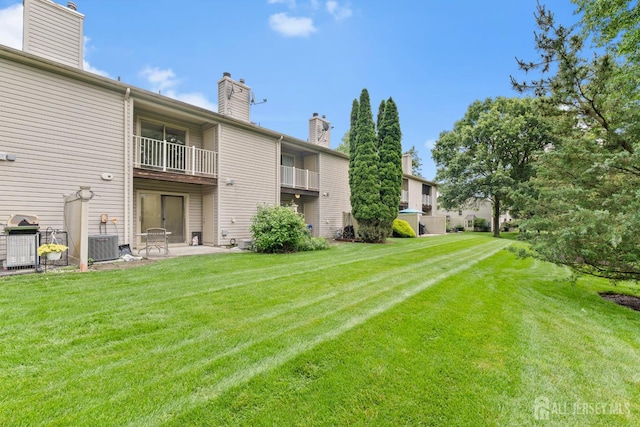 13 Stuart Dr Unit 5, Freehold, NJ 07728 - view of green lawn with a patio and a balcony