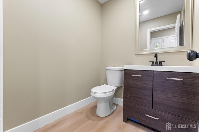 13 Stuart Dr Unit 5, Freehold, NJ 07728 - bathroom featuring wood finished floors and vanity