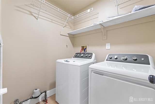 13 Stuart Dr Unit 5, Freehold, NJ 07728 - laundry area featuring independent washer and dryer and baseboards