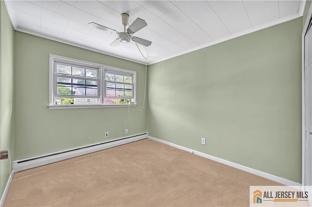 146 Arlington Dr, Fords, NJ 08863 - spare room featuring a baseboard heating unit, carpet flooring, a ceiling fan, baseboards, and crown molding