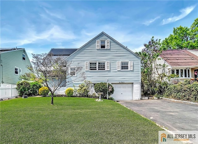 146 Arlington Dr, Fords, NJ 08863 - view of front of house featuring driveway and a garage