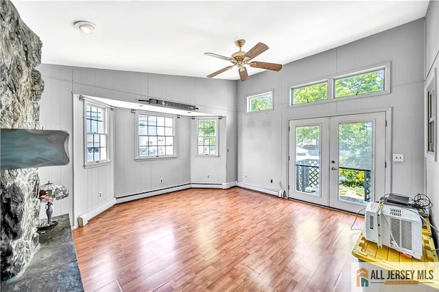 146 Arlington Dr, Fords, NJ 08863 - unfurnished living room with a ceiling fan, wood finished floors, healthy amount of natural light, and french doors