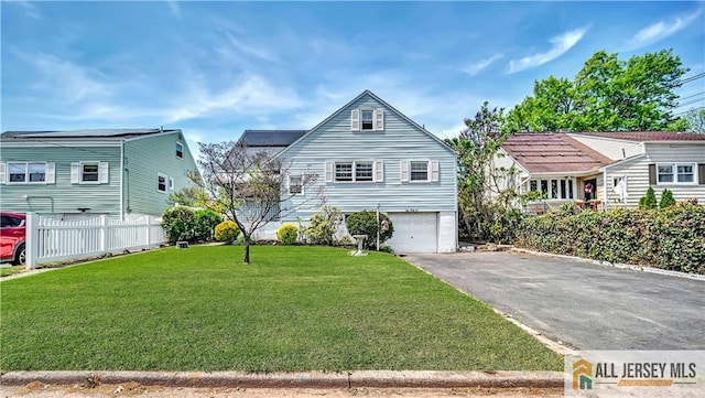 146 Arlington Dr, Fords, NJ 08863 - view of front facade with asphalt driveway and an attached garage