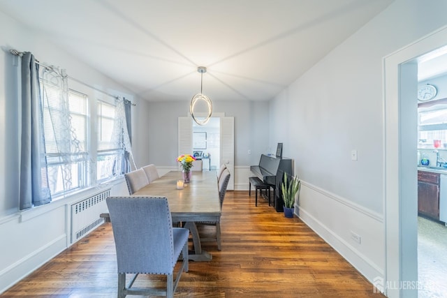 292 Morton Ave, Rahway, NJ 07065 - dining area with radiator heating unit and wood finished floors
