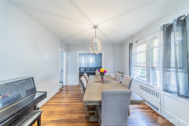292 Morton Ave, Rahway, NJ 07065 - dining space with radiator and dark wood-style flooring