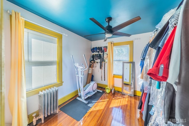 292 Morton Ave, Rahway, NJ 07065 - exercise room featuring radiator, ceiling fan, wood finished floors, and baseboards