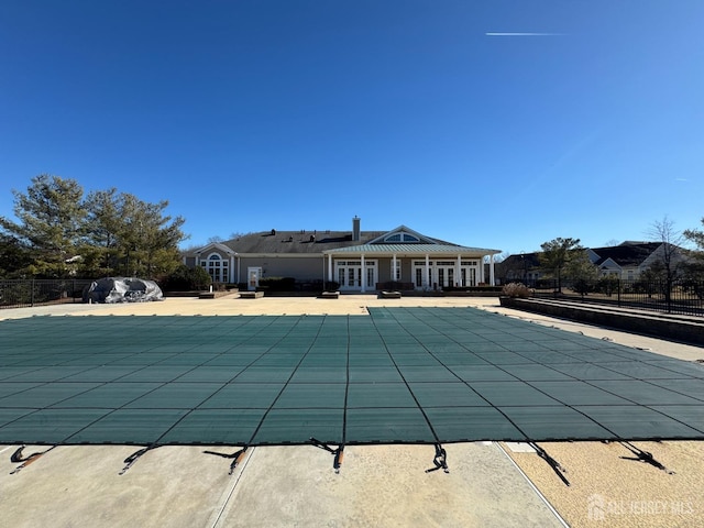 116 Prusakowski Blvd, Sayreville, NJ 08859 - view of swimming pool featuring fence, a fenced in pool, french doors, and a patio area