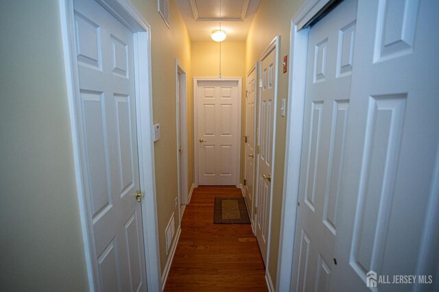116 Prusakowski Blvd, Sayreville, NJ 08859 - hallway with baseboards, attic access, dark wood finished floors, and visible vents