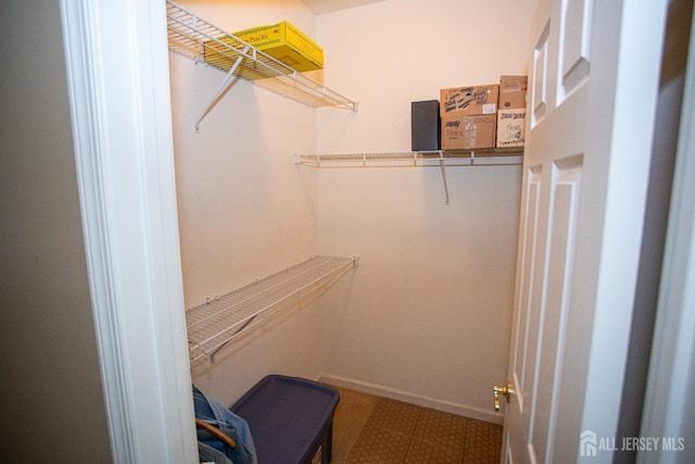 116 Prusakowski Blvd, Sayreville, NJ 08859 - spacious closet featuring tile patterned floors