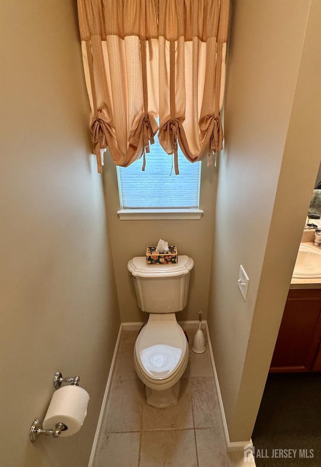 116 Prusakowski Blvd, Sayreville, NJ 08859 - bathroom with toilet, baseboards, tile patterned flooring, and vanity
