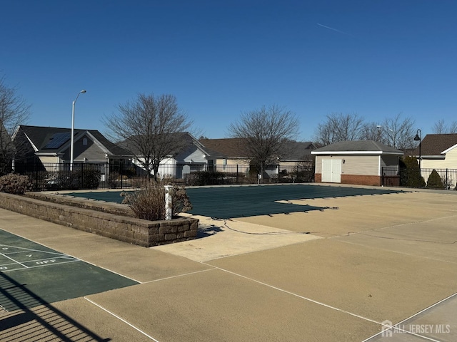 116 Prusakowski Blvd, Sayreville, NJ 08859 - pool with fence, shuffleboard, and a residential view