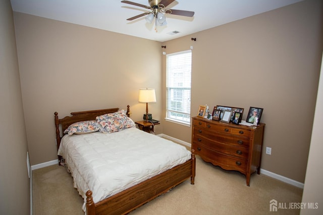 116 Prusakowski Blvd, Sayreville, NJ 08859 - bedroom with light colored carpet, baseboards, visible vents, and a ceiling fan