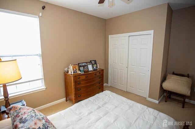 116 Prusakowski Blvd, Sayreville, NJ 08859 - carpeted bedroom featuring baseboards, a ceiling fan, and a closet