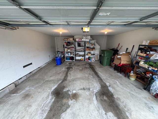 116 Prusakowski Blvd, Sayreville, NJ 08859 - garage featuring a garage door opener