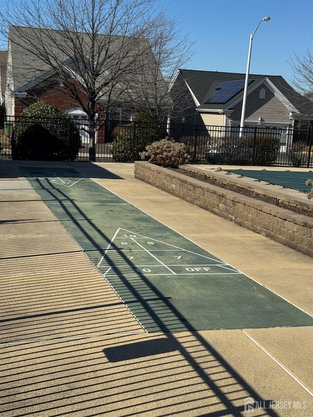 116 Prusakowski Blvd, Sayreville, NJ 08859 - view of home's community with fence and shuffleboard