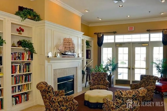 116 Prusakowski Blvd, Sayreville, NJ 08859 - living area featuring ornamental molding, a fireplace, french doors, and built in shelves