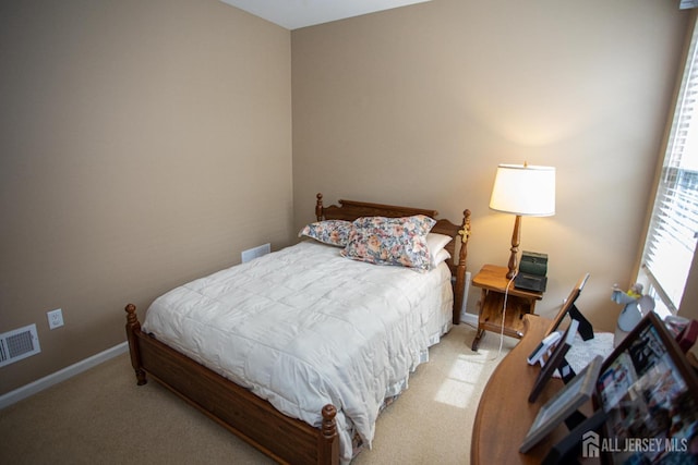 116 Prusakowski Blvd, Sayreville, NJ 08859 - bedroom with baseboards, visible vents, and light carpet