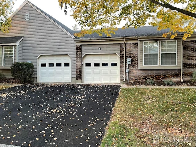 view of property exterior with a garage