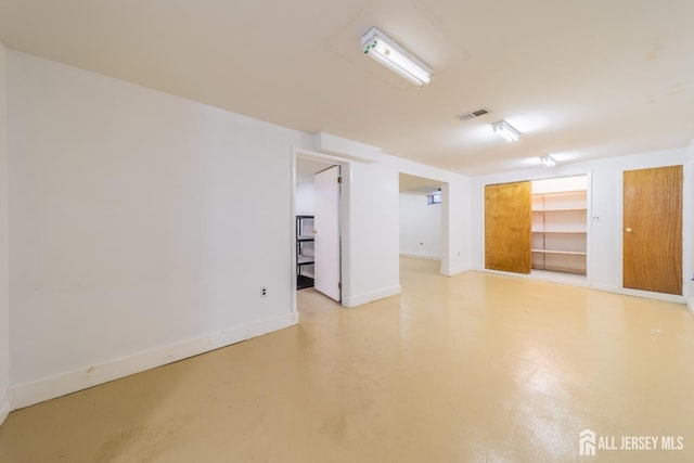 289 Old Rd, Sewaren, NJ 07077 - empty room with finished concrete flooring and baseboards