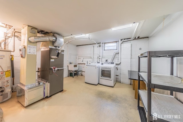 289 Old Rd, Sewaren, NJ 07077 - basement featuring washing machine and dryer, water heater, and a sink