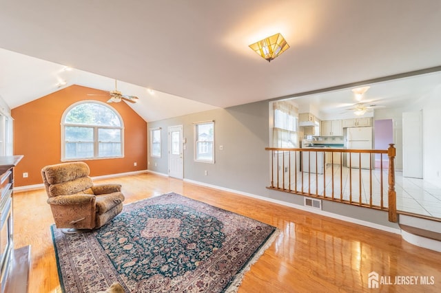 289 Old Rd, Sewaren, NJ 07077 - sitting room featuring ceiling fan, light wood finished floors, baseboards, and lofted ceiling
