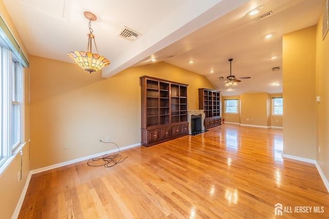 289 Old Rd, Sewaren, NJ 07077 - unfurnished living room with light wood-style flooring, ceiling fan, baseboards, and lofted ceiling