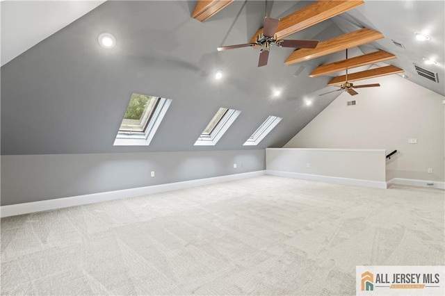 bonus room featuring a skylight, carpet flooring, a ceiling fan, baseboards, and recessed lighting