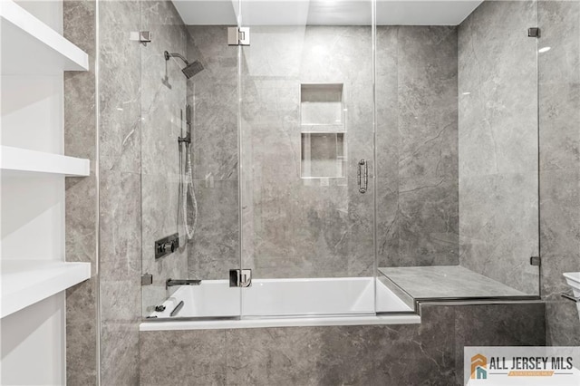 full bath featuring tiled shower / bath combo