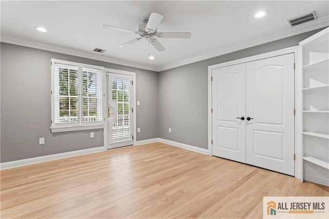 unfurnished bedroom with ornamental molding, light wood finished floors, access to exterior, recessed lighting, and baseboards
