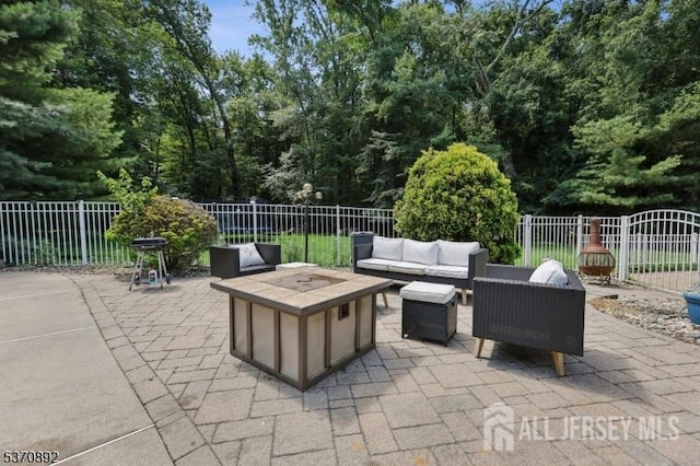 101 Pergola Ave, Monroe, NJ 08831 - fenced backyard featuring an outdoor living space with a fire pit and a patio